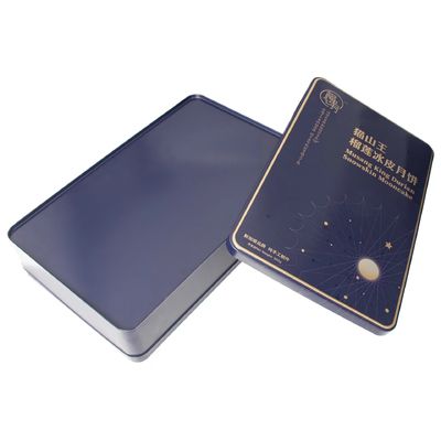 札入れの金属の錫は容器の正方形のビスケットの箱の長方形贅沢な月のケーキを囲む